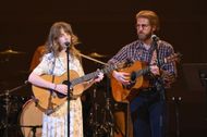 Maya Hawke and Christian Lee Hutson performing together (Image via Getty)